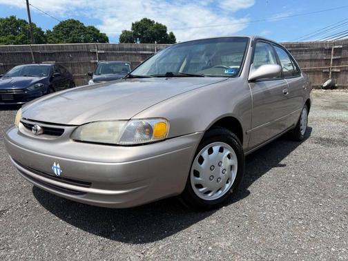 Tan 1999 Toyota Corolla CE
