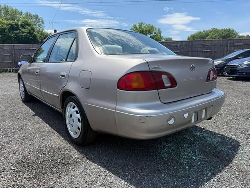 Tan 1999 Toyota Corolla CE