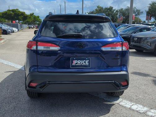 Blue Crush Metallic/Jet Black 2024 Toyota Corolla Cross Hybrid SE