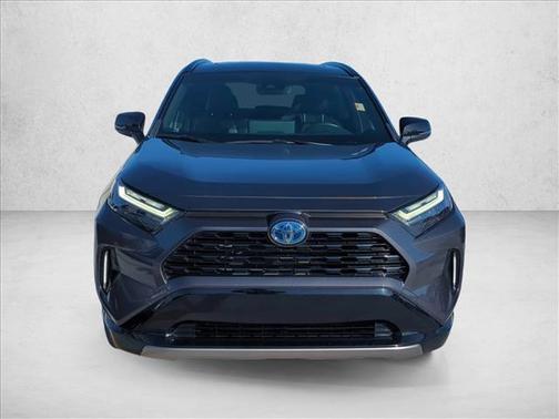 Silver Sky Metallic/Midnight Black Metallic 2023 Toyota RAV4 Hybrid SE