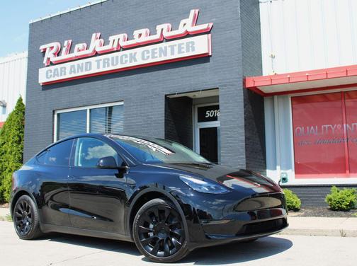 Solid Black 2025 Tesla Model Y Long Range Dual Motor All-Wheel Drive