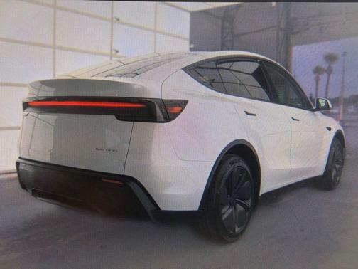 Pearl White Multi-Coat 2026 Tesla Model Y Long Range Launch Series