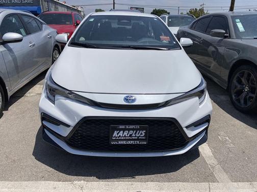 Wind Chill Pearl 2024 Toyota Corolla Hybrid SE