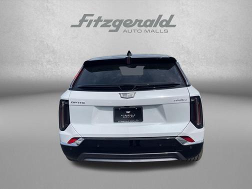 Vibrant White Tricoat 2026 Cadillac OPTIQ Premium Luxury