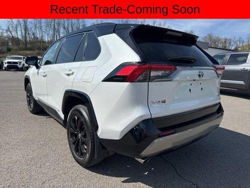 Wind Chill Pearl/Midnight Black Metallic 2024 Toyota RAV4 Hybrid SE