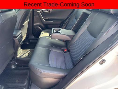 Wind Chill Pearl/Midnight Black Metallic 2024 Toyota RAV4 Hybrid SE