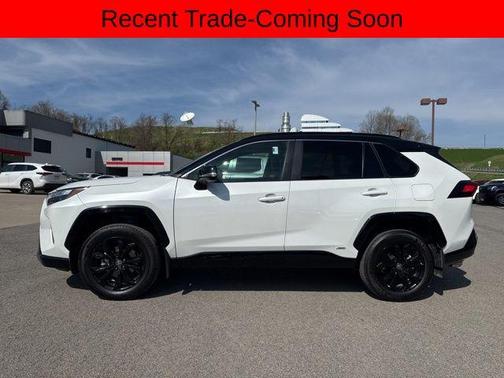 Wind Chill Pearl/Midnight Black Metallic 2024 Toyota RAV4 Hybrid SE