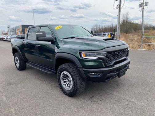 Serrano Green Metallic 2026 RAM 1500 RHO Crew Cab 4x4 5'7' Box