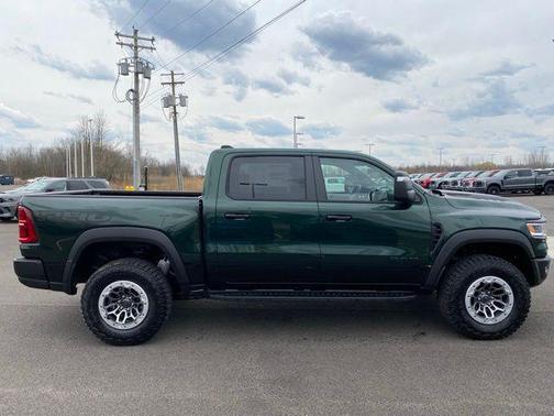 Serrano Green Metallic 2026 RAM 1500 RHO Crew Cab 4x4 5'7' Box