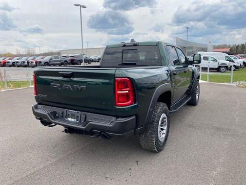 Serrano Green Metallic 2026 RAM 1500 RHO Crew Cab 4x4 5'7' Box