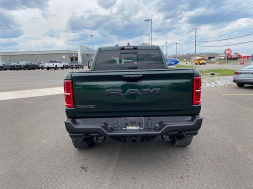 Serrano Green Metallic 2026 RAM 1500 RHO Crew Cab 4x4 5'7' Box