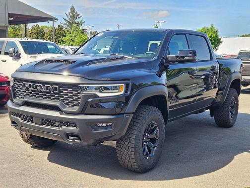 Diamond Black Crystal Pearlcoat 2026 RAM 1500 RHO Crew Cab 4x4 5'7' Box