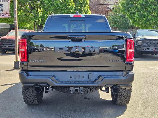 Diamond Black Crystal Pearlcoat 2026 RAM 1500 RHO Crew Cab 4x4 5'7' Box