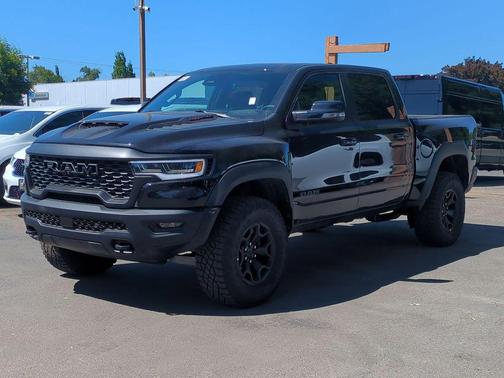 Diamond Black Crystal Pearlcoat 2026 RAM 1500 RHO Crew Cab 4x4 5'7' Box