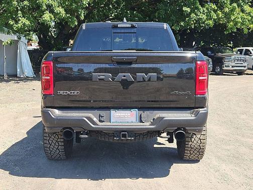 Diamond Black Crystal Pearlcoat 2026 RAM 1500 RHO Crew Cab 4x4 5'7' Box