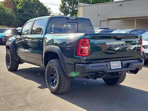 Serrano Green Metallic 2026 RAM 1500 RHO Crew Cab 4x4 5'7' Box