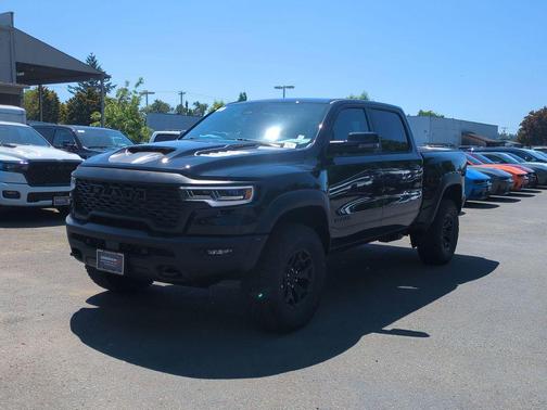 Diamond Black Crystal Pearlcoat 2026 RAM 1500 RHO Crew Cab 4x4 5'7' Box