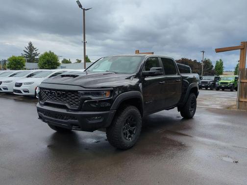 Diamond Black Crystal Pearlcoat 2026 RAM 1500 RHO Crew Cab 4x4 5'7' Box