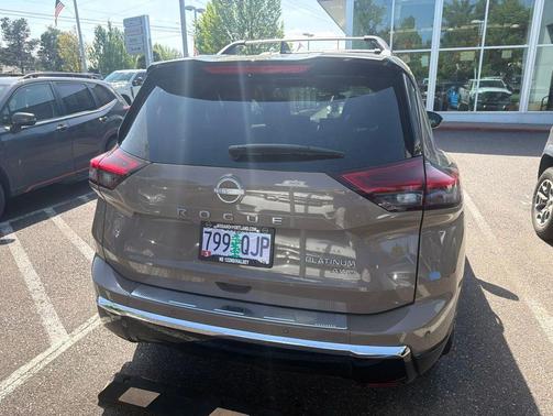 Baja Storm Metallic/Super Black 2025 Nissan Rogue Platinum