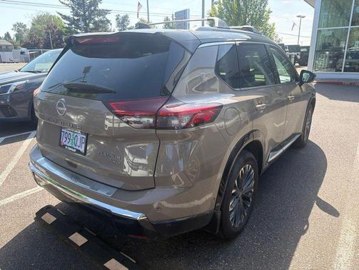 Baja Storm Metallic/Super Black 2025 Nissan Rogue Platinum