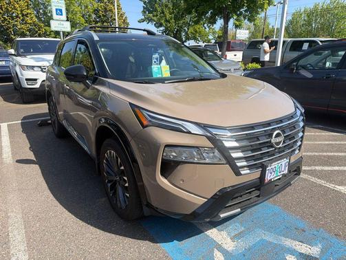 Baja Storm Metallic/Super Black 2025 Nissan Rogue Platinum