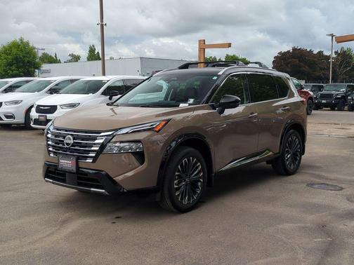 Baja Storm Metallic/Super Black 2025 Nissan Rogue Platinum