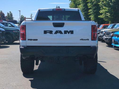 Bright White Clearcoat 2026 RAM 1500 RHO Crew Cab 4x4 5'7' Box