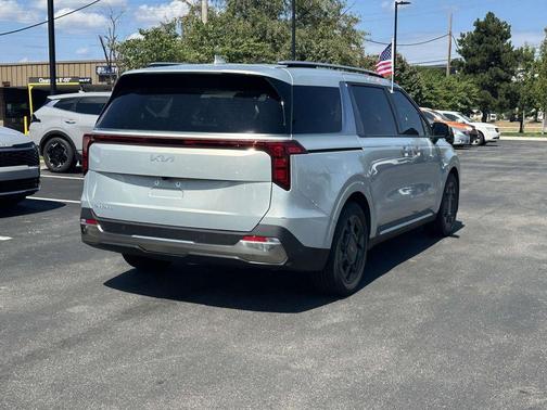 Ivory Silver 2025 Kia Carnival SX