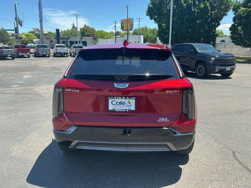 Radiant Red Tintcoat 2025 Cadillac OPTIQ Sport 2 AWD