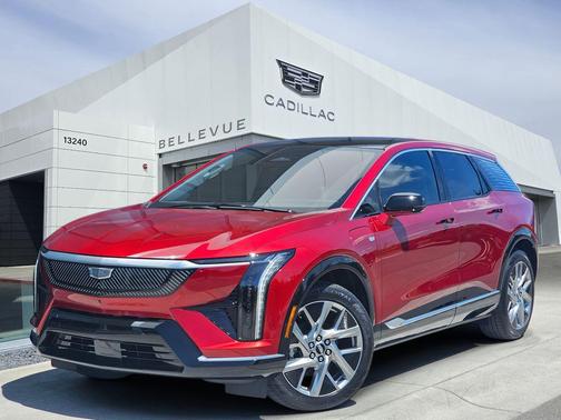 Radiant Red Tintcoat 2026 Cadillac OPTIQ Luxury