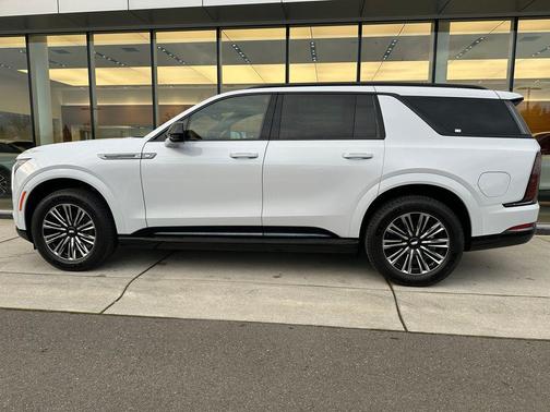 Vibrant White Tricoat 2026 Cadillac Escalade IQL Sport
