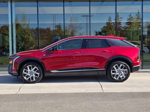 Radiant Red Tintcoat 2025 Cadillac OPTIQ Luxury 1 AWD