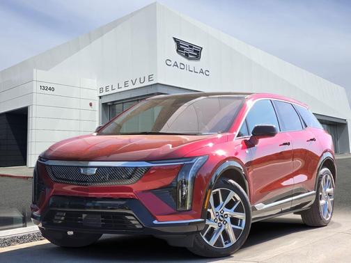 Radiant Red Tintcoat 2025 Cadillac OPTIQ Luxury 1 AWD