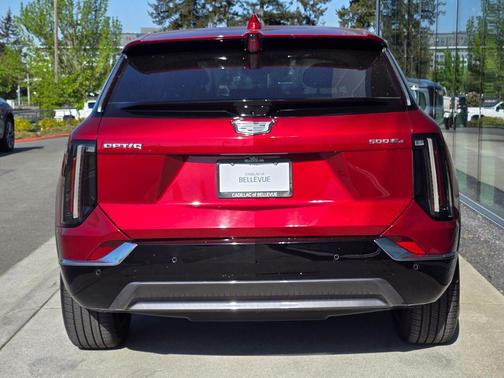 Radiant Red Tintcoat 2025 Cadillac OPTIQ Luxury 1 AWD