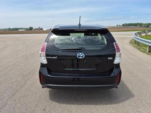 Attitude Black 2015 Toyota Prius v Five