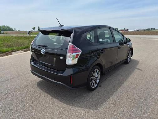 Attitude Black 2015 Toyota Prius v Five