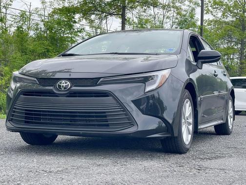 Midnight Black Metallic 2026 Toyota Corolla Hybrid LE