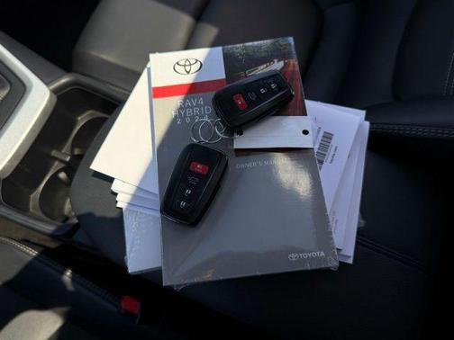 Silver Sky Metallic 2024 Toyota RAV4 Hybrid XLE Premium