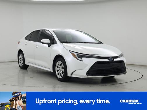 White 2024 Toyota Corolla Hybrid LE