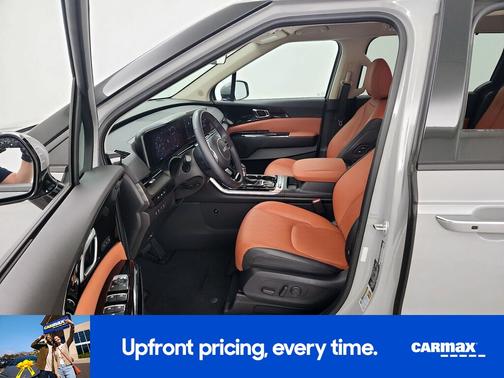 Gray 2024 Kia Carnival SX