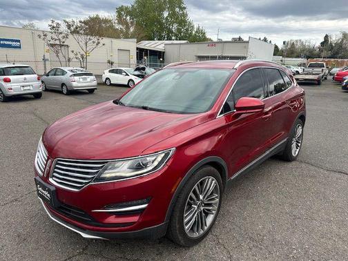 Ruby Red Metallic Tinted Clearcoat 2015 Lincoln MKC Base