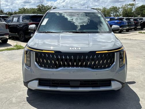 Ceramic Silver 2026 Kia Carnival Hybrid EX