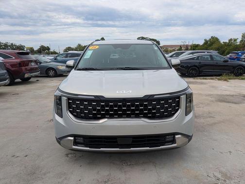 Ivory Silver 2025 Kia Carnival SX