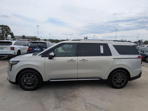 Ivory Silver 2025 Kia Carnival SX