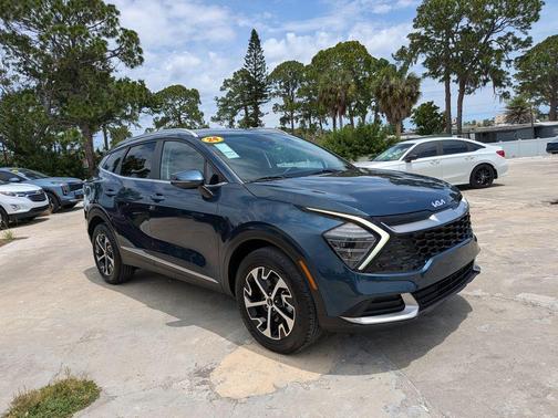 Blue 2024 Kia Sportage Hybrid EX
