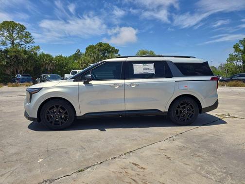 Ivory Silver 2026 Kia Carnival SX Prestige