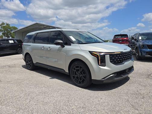 Ivory Silver 2026 Kia Carnival Hybrid SX