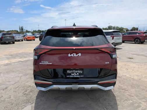 Red 2023 Kia Sportage Hybrid SX-Prestige