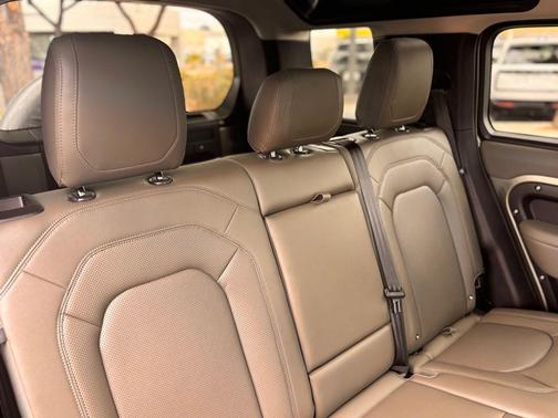 Gold 2024 Land Rover Defender P400 X-Dynamic SE