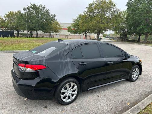 Midnight Black Metallic 2025 Toyota Corolla LE